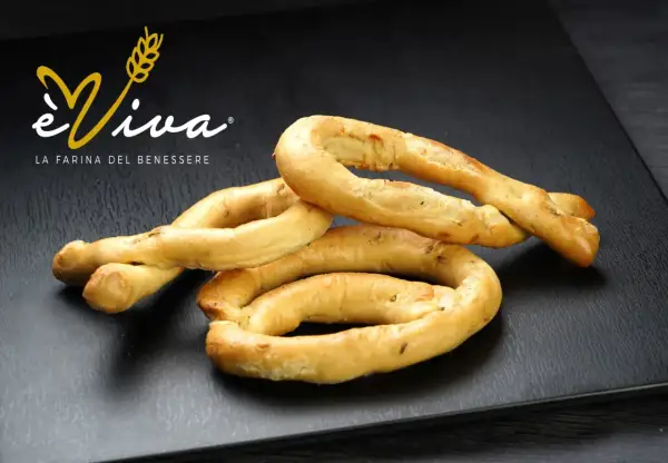 Délicieux taralli, parfaits pour une recette simple et savoureuse. Le logo "éViva" est visible.